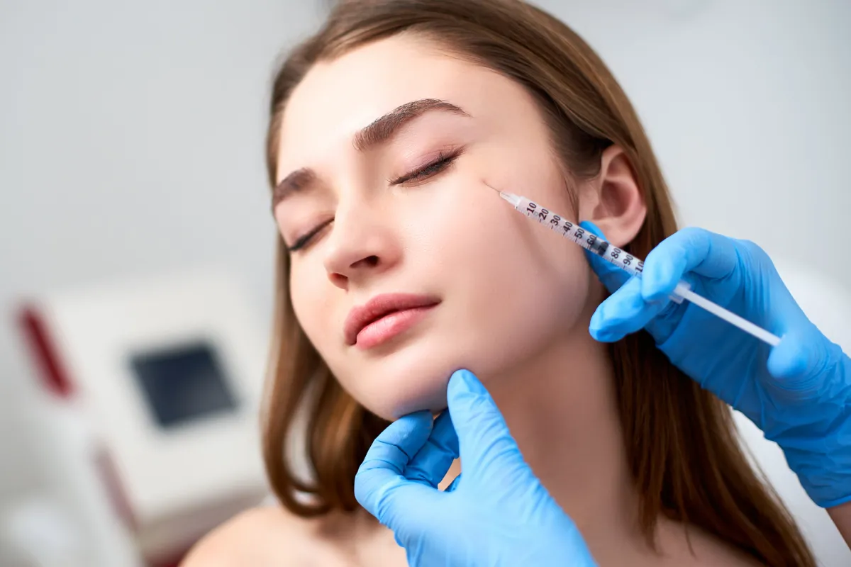 Woman receiving precise Botox injections for crows feet at Magnetic Aesthetics